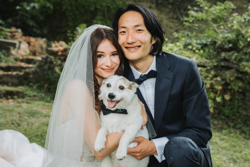 Couple portrait with dog Lost Music Hall destination wedding photographer.